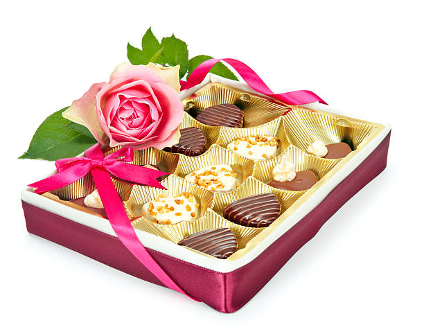 istock Box of chocolate pralines isolated on white 173722629
