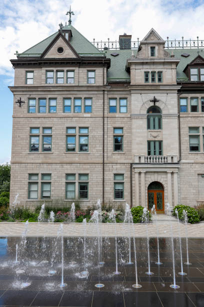 istock water splash besides the Hotel de Ville in the Old Quebec, Canada. 1737227016