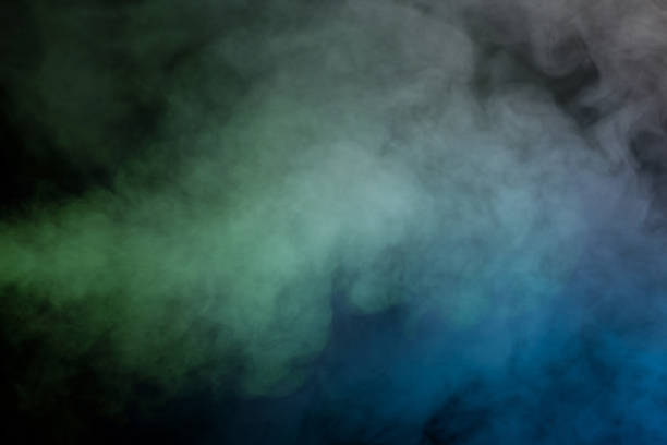 istock Green and white steam on a black background. 1737229348