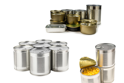Group of silver canned food on white background.