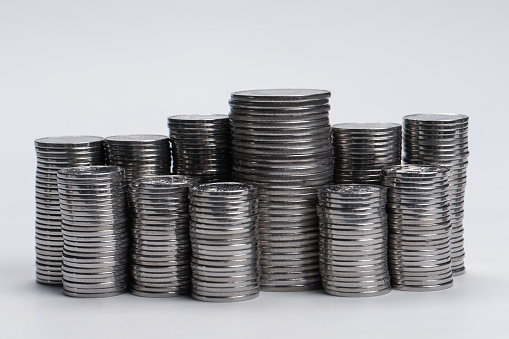 Pile of coins isolated on a white background. Banking and money.