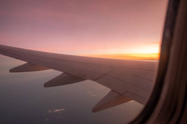 istock Sky, cloud during the sunrise from window of airplane. 1737231576