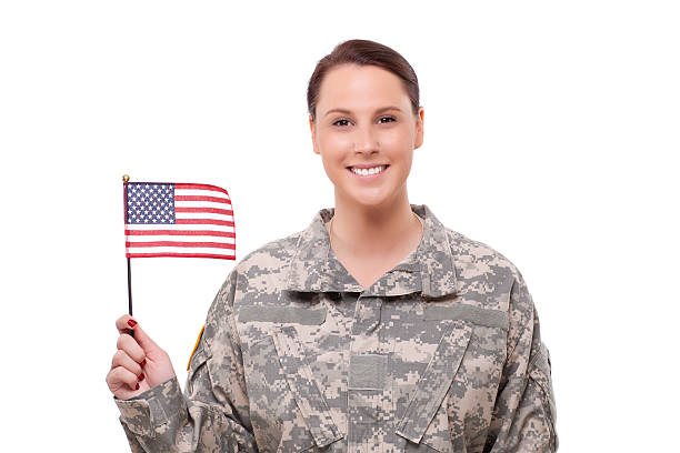 istock Female army soldier with American flag 173724640