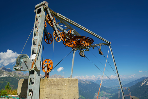 istock Drive wheel of an abandoned alpine ski lift 1737248774