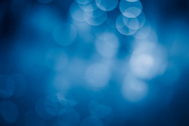 Blurred blue sparkles stock photo