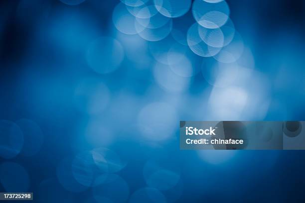 Blurred Blue Sparkles Stock Photo - Download Image Now - Blue, Illuminated, Lighting Equipment