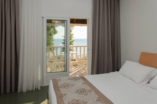 istock Room with double bed with sea view. 1737283487