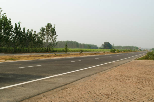 istock Clean and empty highway road at uttar pradesh 1737286735