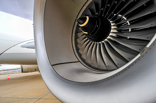 Lisbon, Portugal: Turbofan engine on an Airbus A330-200, a GE CF6-80E1A4 - The General Electric CF6, US military designations F103 and F138, is a family of high-bypass turbofan engines produced by GE Aviation. Based on the TF39, the first high-power high-bypass jet engine, the CF6 powers a wide variety of civilian airliners.