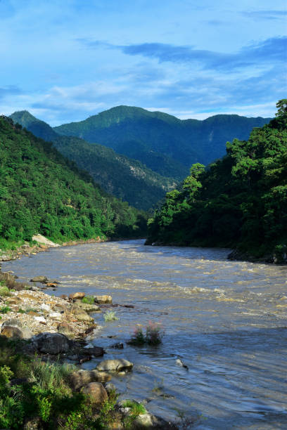 istock Vertical view of landscape with river and green mountain 1737292394
