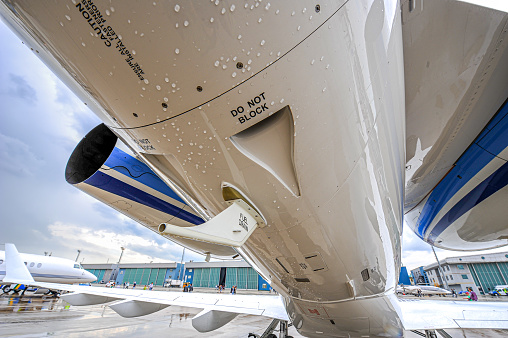 Jet engine and landing gear flying in the air