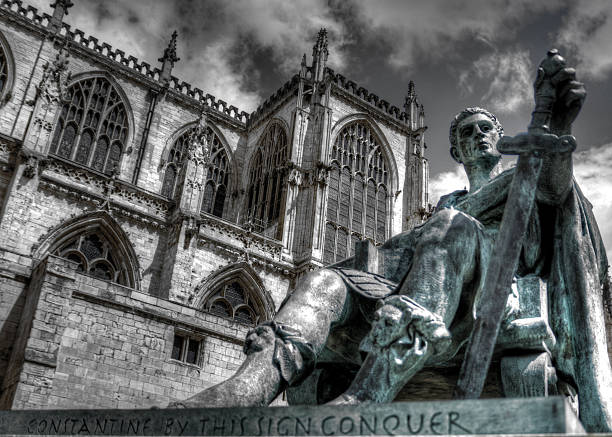 Emperor Constantine - York Minster A HDR image of a large bronze sculpture of the 4th-century Roman Emperor Constantine, located outside York Minster, UK. statue of emperor constantine york minster stock pictures, royalty-free photos & images