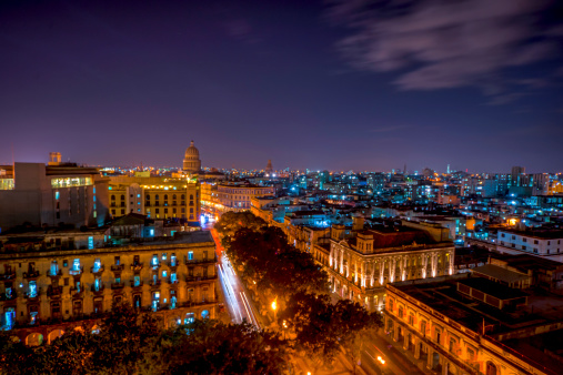 Taken from the top floor restaurant of the Hotel Seville Biltmore in Havana Cuba. The lights of the city highlight the unique urban landscape of the City with the Capitol Building in the background