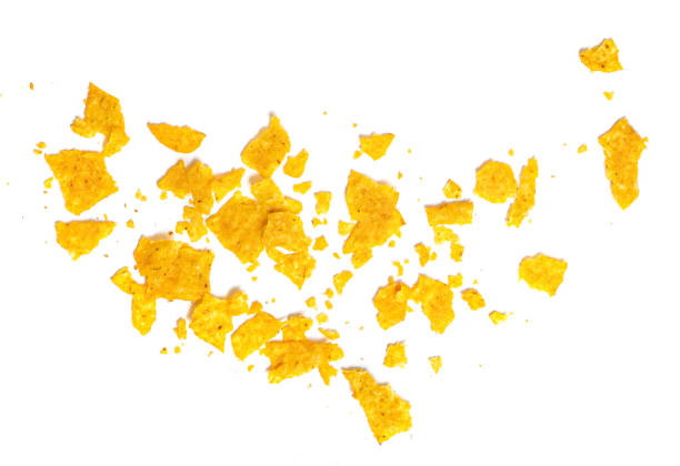 istock Chips Crumbs  isolated on white background. Crispy broken  chips  Top view. Flat lay. Creative food layout 1737320246