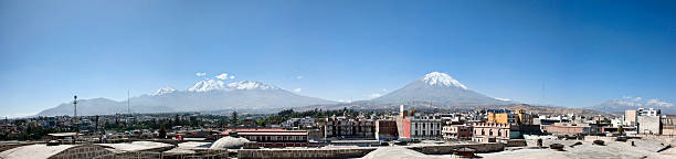 Volcano El Misti rising behind the city of Arequipa stock photo