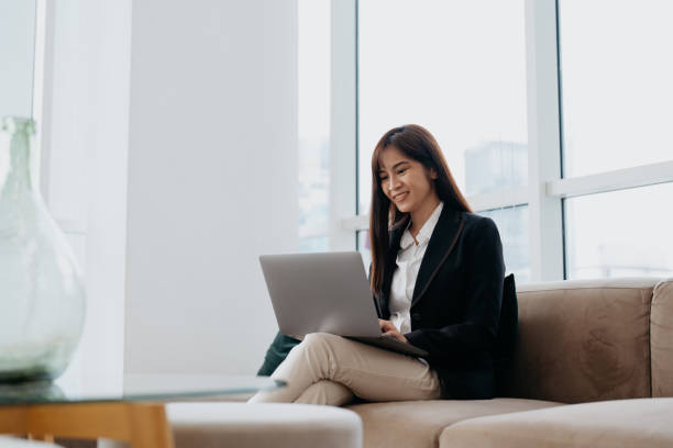 istock Asian businesswoman using laptop in modern office 1737333650
