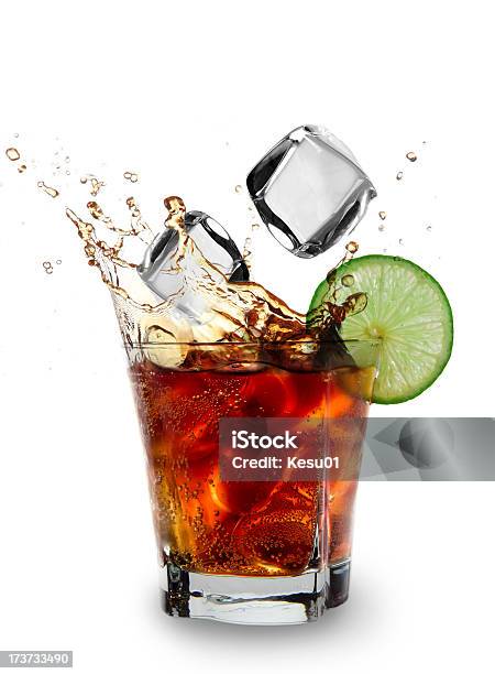 Cola Glass With Falling Ice Cubes Stock Photo - Download Image Now - Alcohol - Drink, Bar - Drink Establishment, Celebration