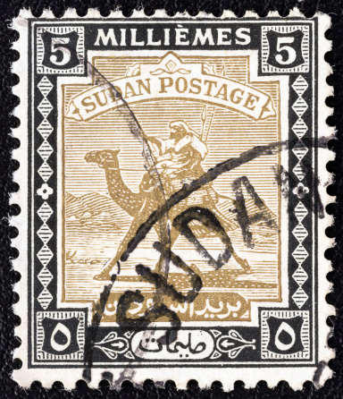 SUDAN - CIRCA 1921: A stamp printed in Sudan shows Arab Postman on camel, circa 1921.