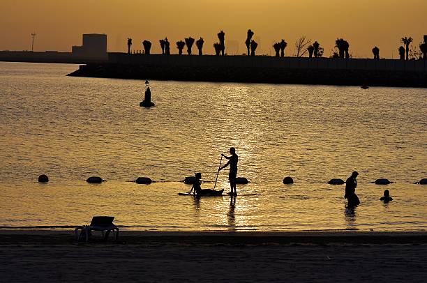 Sunset in Al Zeina Al Raha Beach stock photo