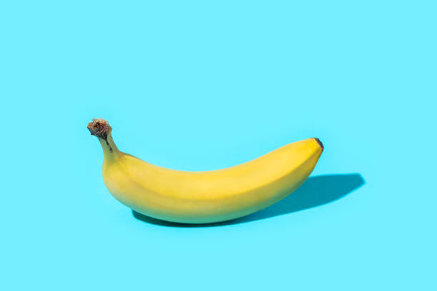 istock Ripe Banana on blue 1737356847