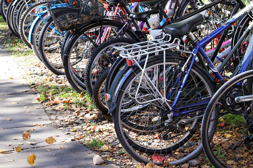 Bike wheels with autumn leaves on the ground