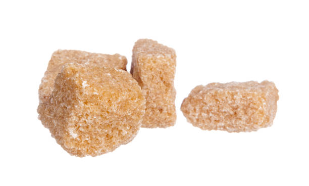 istock brown sugar cubes isolated on white background 1737385170