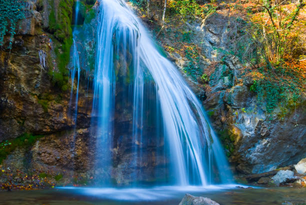 istock big waterfall on the mountain river  fall in the canyon 1737387717
