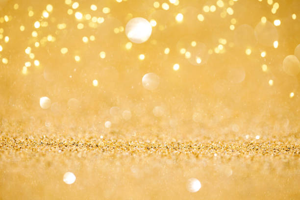 istock Abstract glitter golden background with copy space 1737416859