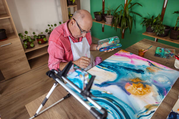 istock Elderly Painter's Artful Moments 1737417384