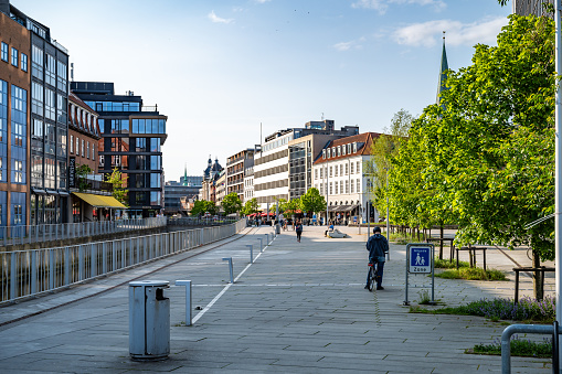City Center of Aarhus, Denmark with pedestrian zone and lots of Buildings in the background in the evening