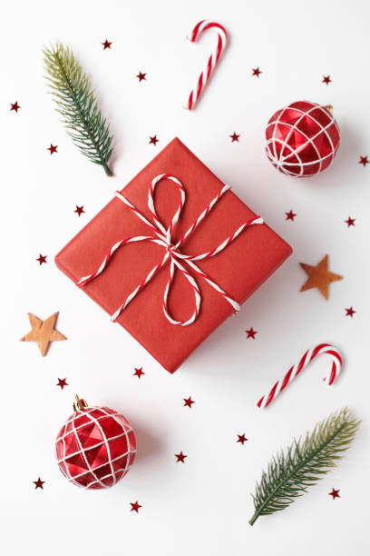 istock Christmas gift with decorations on white background 1737426902