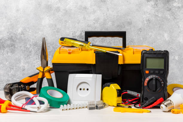 istock Electrician equipment on marble background with copy space.Top view.Electrician tool set.Multimeter, tester,screwdrivers,cutters,duct tape,lamps,tape measure and wires.Flet lay. 1737428036