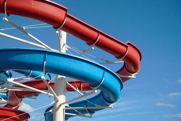 istock Vibrant aqua slide at a seaside water park 1737437441