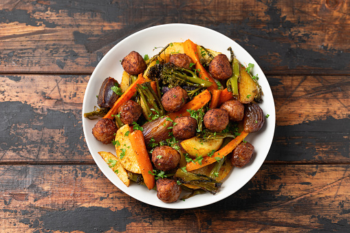 Baked meatballs with Roasted vegetables, potato, carrots, tenderstem broccoli and onions.