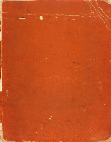 an antique book cover with age effects, crease and texture