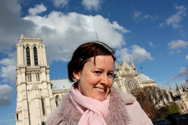 istock Girl at Notre Dame Cathedral Paris 173748960