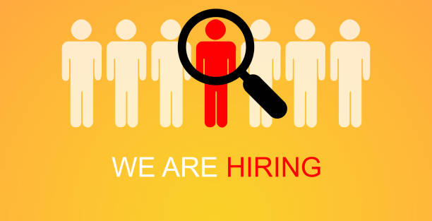 We are hiring simple design with yellow human sign as a symbol of chosen by recruiter. Social media banner template for job vacancy. stock photo
