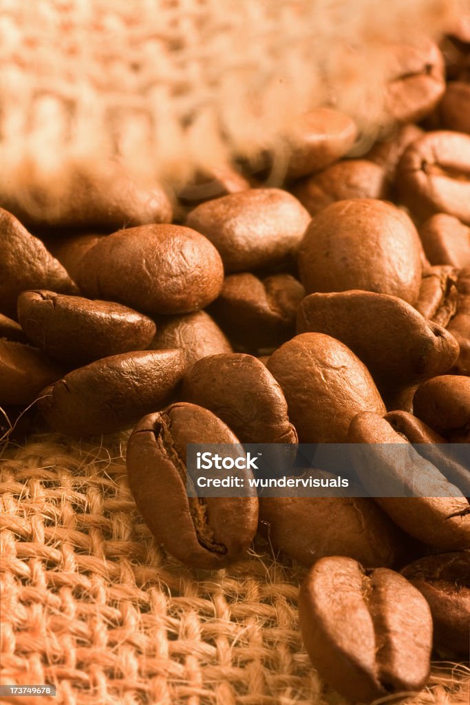 coffe beans in bean bag coffe beans in bean bag. cloe up macro. Backgrounds Stock Photo