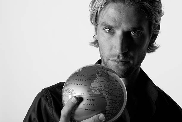 istock Attractive Man and Globe - World In My Hands 173750091