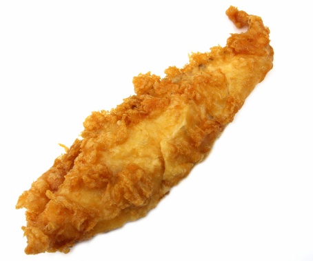 piece of battered cod on white background