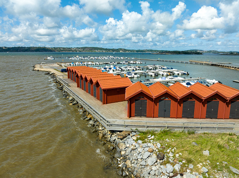 aerial view of a row identical beach houses in Getskar, Sweden