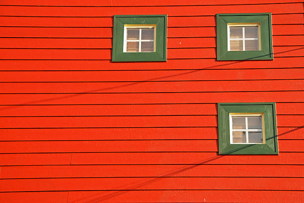 istock Red building with green framed windows 173751153