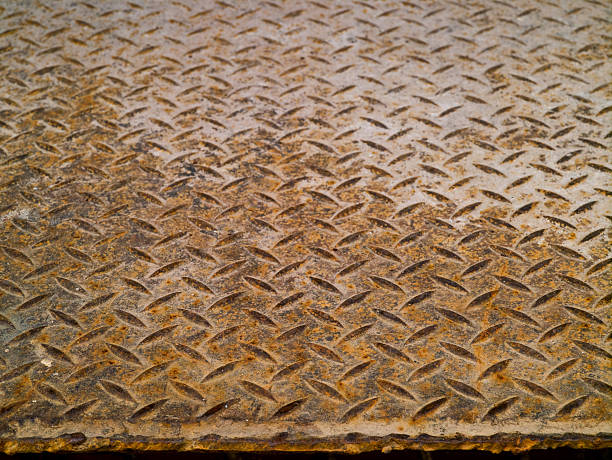 istock Rusted metal diamond plate 173752223