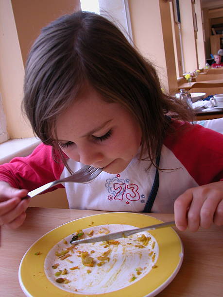 istock Child eating all her food 173752409