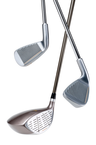 Golf clubs hanging isolated on white with clipping path