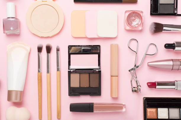 istock Flat lay with makeup products and tools on color background 1737533298