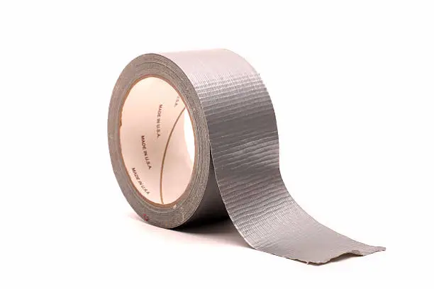 A roll of duct tape isolated on a white background.