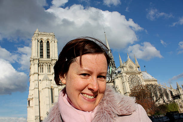istock Girl at Notre Dame Cathedral Paris 173753622