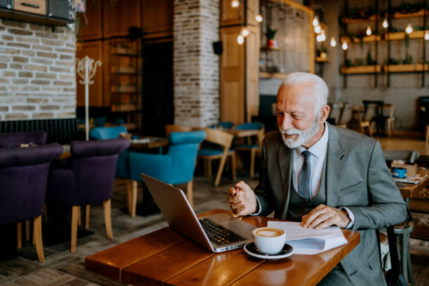 istock Senior entrepreneur's cafe office 1737544252