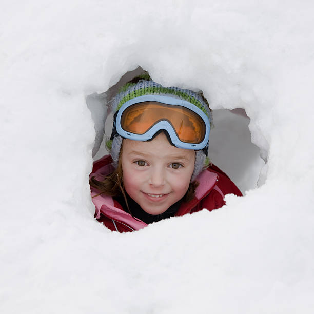 Snow Cave Girl stock photo